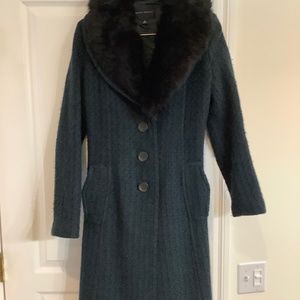 Coat with fur collar